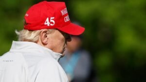 Former White House aide says Donald Trump beat two pro golfers